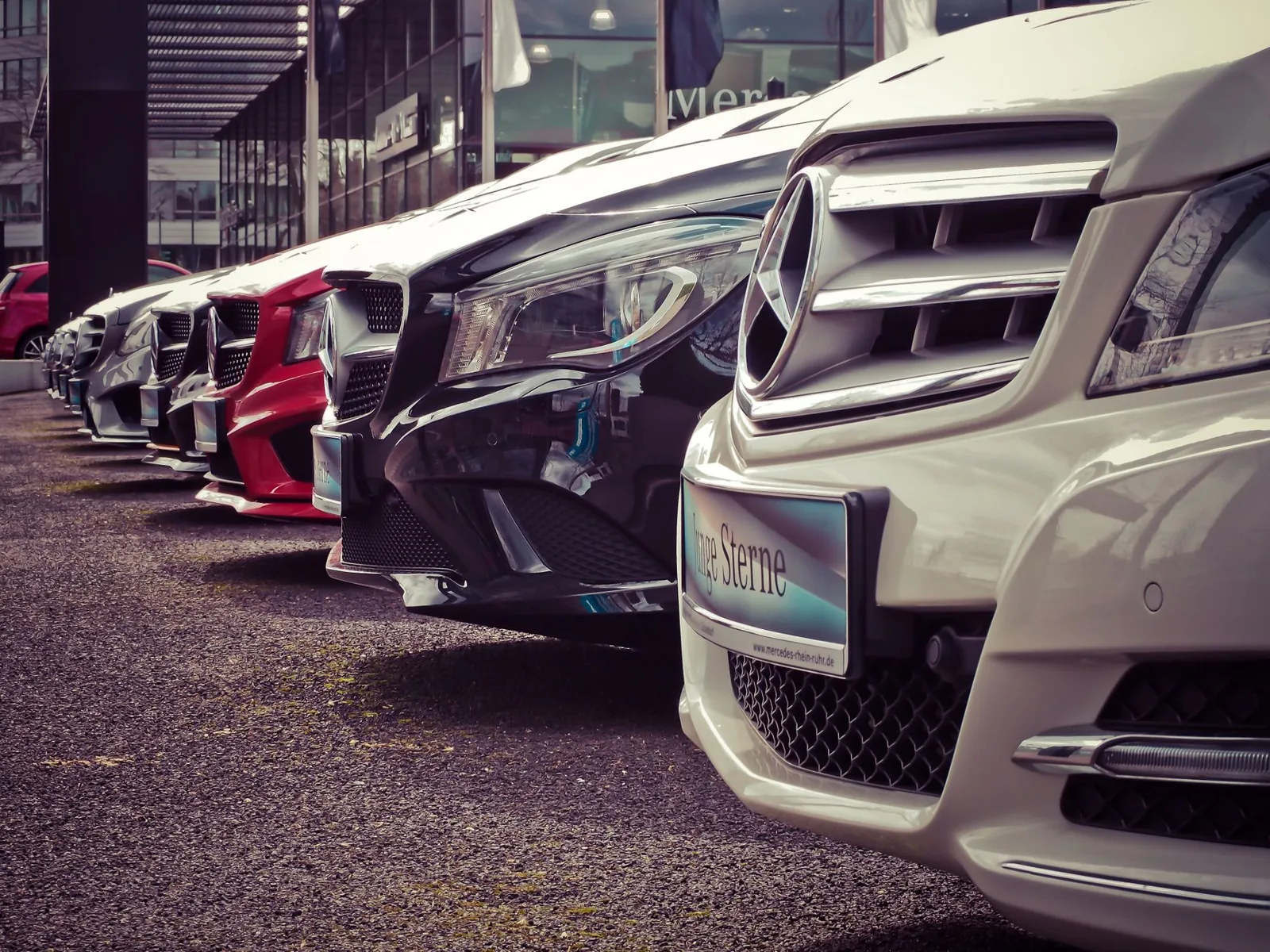 Car rental insurance vs personal auto insurance comparison at a rental counter